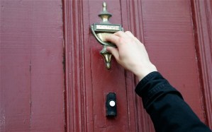 man knocking at door